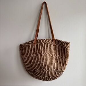 chic brown woven straw tote bag